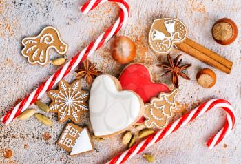 christmas background, christmas cookie and candycane on a table