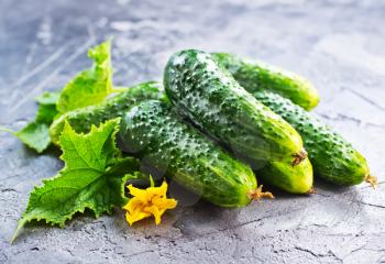 fresh cucumbers on the wooden table, stock photo