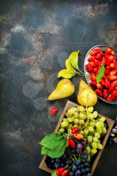 autumn fruits on a table, stock photo