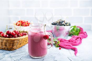 smoothie with fresh berries on a table