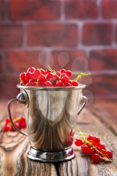red currant on the wooden table,stock photo