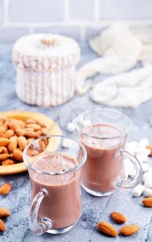 cocoa drink with almond and on a table