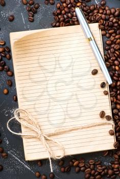 coffee beans and note on a table