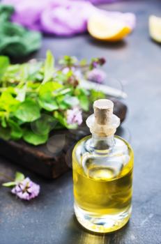 herbal oil in bottle and on a table