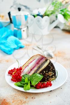 cake with fresh red currant on plate