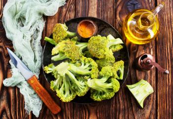 broccoli on a table, fresh broccoli, stock photo