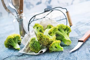 broccoli on a table, fresh broccoli, stock photo