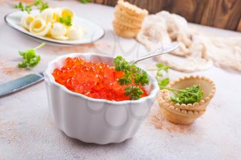butter with bread and red salmon caviar