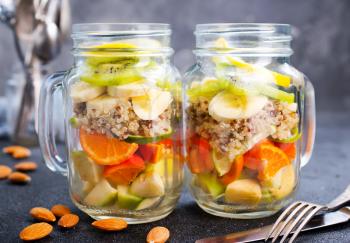 fruit salad with almond, salad in glass bank
