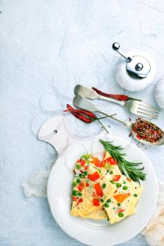 omelette with vegetables, breakfast on a table, stock photo