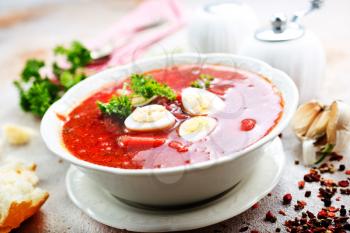 Traditional Ukrainian borsch, red beet soup with boiled eggs