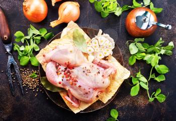 raw chicken and spice on a table, stock photo