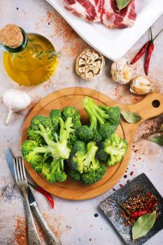 raw broccoli, diet food, raw broccoli on a table, stock photo
