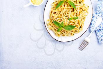 pasta with pesto on plate, spaghetty with pesto and nuts