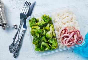 diet food in lunchbox, seafood and vegetables in lunchbox