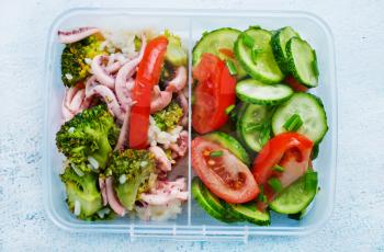 diet food in lunchbox, seafood and vegetables in lunchbox