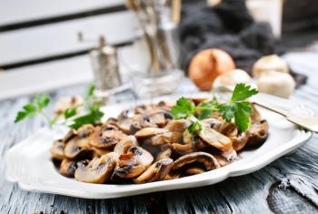 fried mushrooms, mushrooms with onion on plate