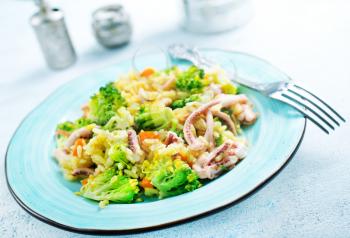 fried vegetables with seafood, fried broccoli with octopus
