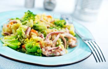 fried vegetables with seafood, fried broccoli with octopus