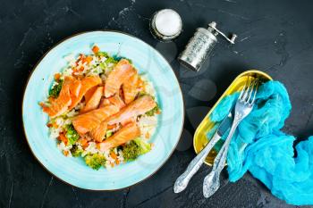 fried salmon with boiled rice and broccoli