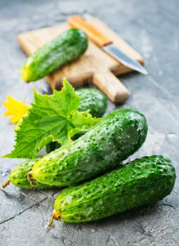 fresh cucumbers on the wooden table, stock photo