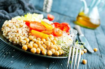 vegan food, vegetables and qinoa on plate