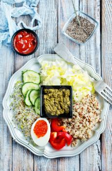 Healthy vegetarian salad with vegetables qinoa chickpea salad leaves. Healthy buddha bowl salad. 