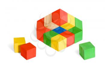 Unreal toy, illusion, impossible wooden colored cubes construction on white background