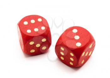 Red wooden dice isolated on white background