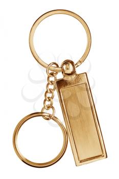 Hanging bronze key chain with scratches with chain and rings isolated on white background