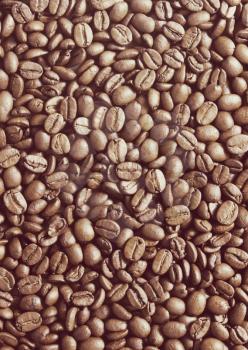 Coffee beans background. Toning effect done with a vintage retro Instagram style filter