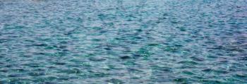 Blue sea water surface with waves
