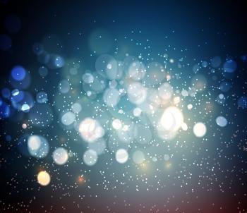 Abstract defocused christmas background. Festive elegant blue abstract background with bokeh  lights 
