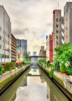 Buildings and canal in Minato ward - Tokyo, Japan