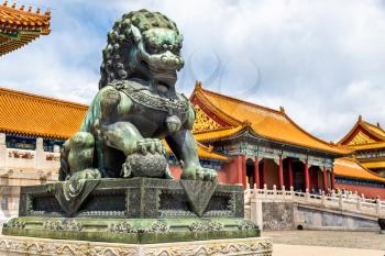 Bronze lion in front of the Hall of Supreme Harmony in Beijing Forbidden City, China