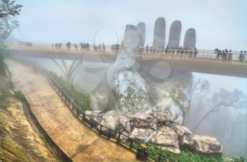 The Golden Bridge, supported by two giant hands, at Ba Na Hills, Vietnam