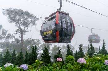 Da Nang, Vietnam - January 4, 2019: Cable car at the Ba Na Hills resort. The Ba Na Cable Car holds world record for the longest non-stop single track cable car at 5801 metres in lenght