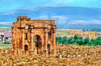 Trajan's Arch within the ruins of Timgad, UNESCO heritage in Algeria.