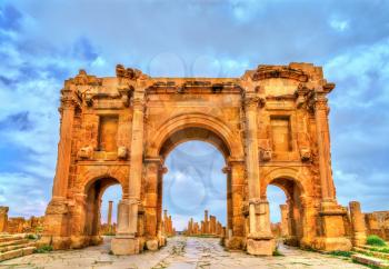 Trajan's Arch within the ruins of Timgad, UNESCO heritage in Algeria.