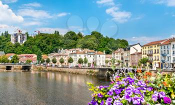 Flowers on a bridge across the Moselle River in Epinal, the Vosges department of France
