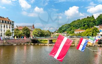 Flags of the EU countries at the Moselle River in Epinal, the Vosges department of France