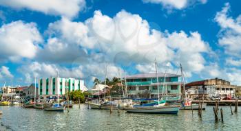 Houses and yachts in the centre of Belize City, the largest city of Belize