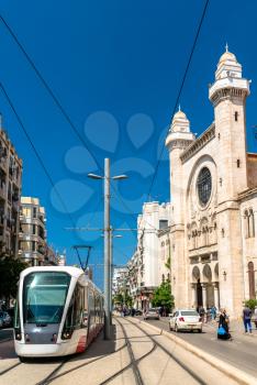 City tram at the Abdellah Ben Salem Mosque in Oran - Algeria, North Africa