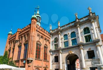 The Golden Gate and the Brotherhood of St. George building in the old town of Gdansk, Poland