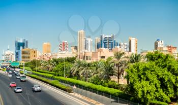 Skyline of Kuwait City along the First Ring Road. The Middle East