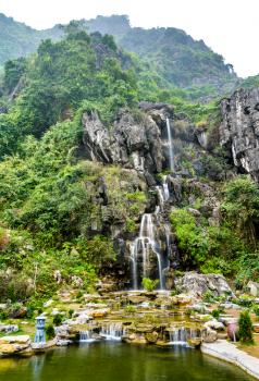 Waterfall at Hang Mua Cave. Trang An scenic area near Ninh Binh, Vietnam