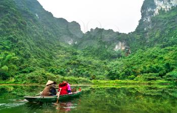 Touristic rowboat at the Trang An Landscape Complex in the Ninh Binh Province of Vietnam