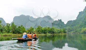 Touristic rowboat at the Trang An Landscape Complex in the Ninh Binh Province of Vietnam