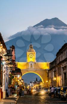 The Santa Catalina Arch and Agua Voclano in Antigua Guatemala, Guatemala