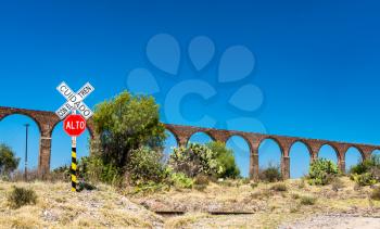 Railroad crossing at the Aqueduct of Padre Tembleque. UNESCO world heritage in Mexico